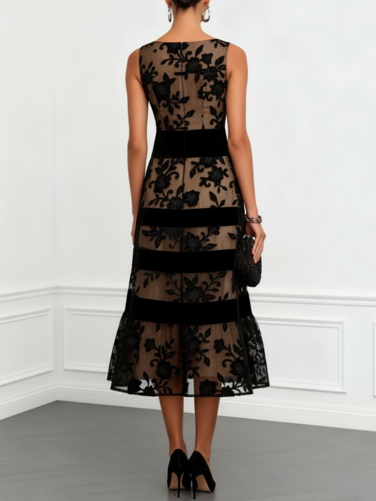Back view of floral mesh midi dress with black waistband and bands