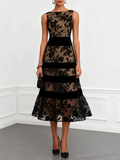 Front view of black floral mesh banded A-line midi dress