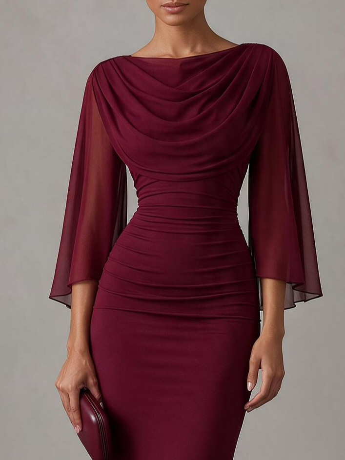 Draped neckline and sheer cape sleeve detail